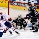 Chiefs forward Adam Beckman (34) scores the game-winning goal against Silvertips goaltender Dustin Wolf (32) during the third period of a playoff game on April 10, 2019, in Spokane. (Colin Mulvany / The Spokesman-Review)