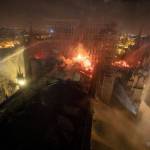 An aerial photo provided Tuesday by the Paris Fire Brigade shows Notre Dame cathedral burning Monday night. (Benoit Moser/BSPP via AP)