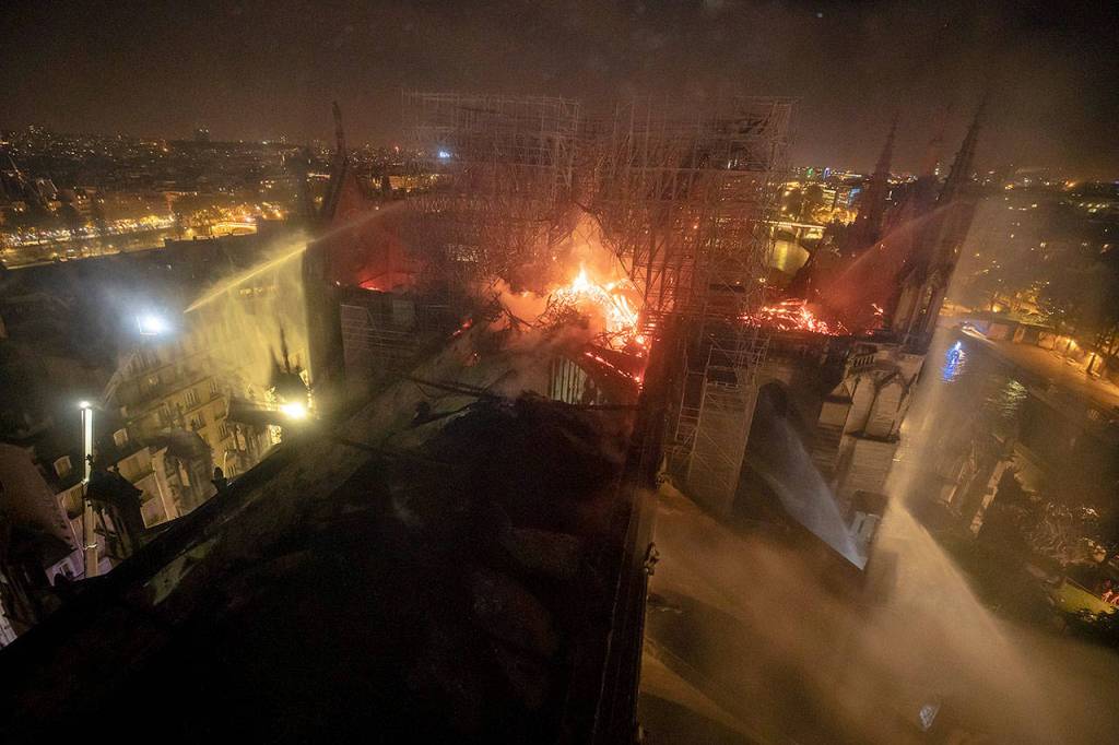 An aerial photo provided Tuesday by the Paris Fire Brigade shows Notre Dame cathedral burning Monday night. (Benoit Moser/BSPP via AP)