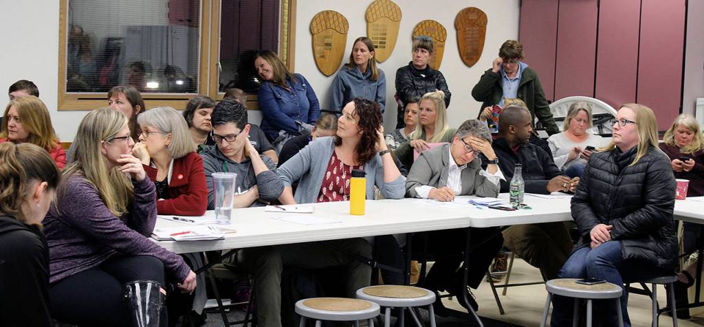 South Whidbey School District Superintendent Jo Moccia (in gray jacket) takes notes during a two-hour exchange of questions and answers between community members and the board of education. (Patricia Guthrie / Whidbey News Group)