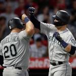 The Mariners Ryon Healy (right) celebrates his three-run home run with Daniel Vogelbach during the second inning of a game against the Angels on April 18, 2019, in Anaheim, Calif. (AP Photo/Jae C. Hong)
