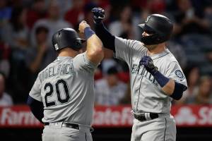 Mariners blow 8-run lead, rally for win over Angels