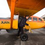After loading passengers, San Juan Airlines pilot Rebecca Watson pulls chocks before piloting a Cessna 207 for an early morning flight to the San Juan Islands from Bellingham International Airport on Tuesday. The little airlinewill begin twice-daily scheduled flights from Everett to the San Juan Islands on May 1. (Andy Bronson / The Herald)