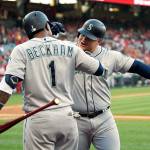 The Mariners Daniel Vogelbach (right) is congratulated by Tim Beckham after hitting a solo home run during the first inning of a game against the Angels on April 20, 2019, in Anaheim, Calif. (AP Photo/Mark J. Terrill)