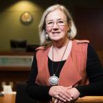 Hannah Patterson is a court-appointed special advocate who represents the best interests of children during the court process. She is shown here in a courtroom Wednesday at the Denney Juvenile Justice Center in Everett. (Andy Bronson / The Herald)