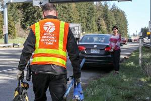 Ken Burettas last call of the day was a driver stranded on the freeway with a damaged tire. (Lizz Giordano/ The Herald)