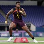 Kentucky linebacker Josh Allen runs through a drill at the NFL scouting combine in March. (AP Photo/Michael Conroy)