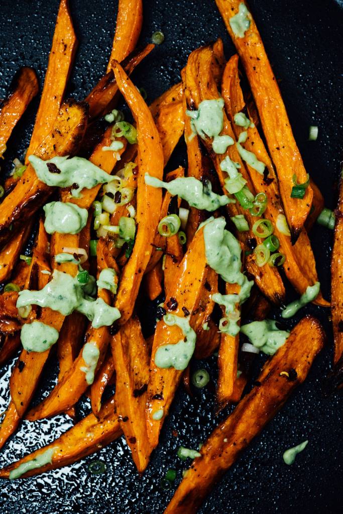 Serve sweet potato fries with a basil yogurt sauce. (Nik Sharma)