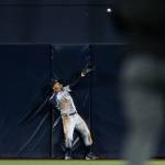 Mariners center fielder Mallex Smith cant make the catch on a two-run home run hit by the Padres Austin Hedges during the sixth inning of a game on April 23, 2019, in San Diego. (AP Photo/Gregory Bull)