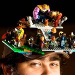 Bryan Hinze, of Lynnwood, sports an Avengers Lego-themed hat, with a couple of DC super heroes mixed in, while attending the first showing of Avengers: Endgame at the AMC Alderwood 16 on Thursday in Lynnwood. (Andy Bronson / The Herald)