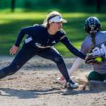 Glacier Peaks Harlee Carpenter (left) reaches to tag Jacksons Kayla Peacocke as she slides into second base during a game at Jackson High School on April 24, 2019, in Mill Creek. (Olivia Vanni / The Herald)