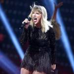 Taylor Swift performs for a screaming crowd in Houston, Texas. (Associated Press)