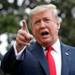 President Donald Trump speaks to the media as he departs the White House on Friday. (AP Photo/Jacquelyn Martin)