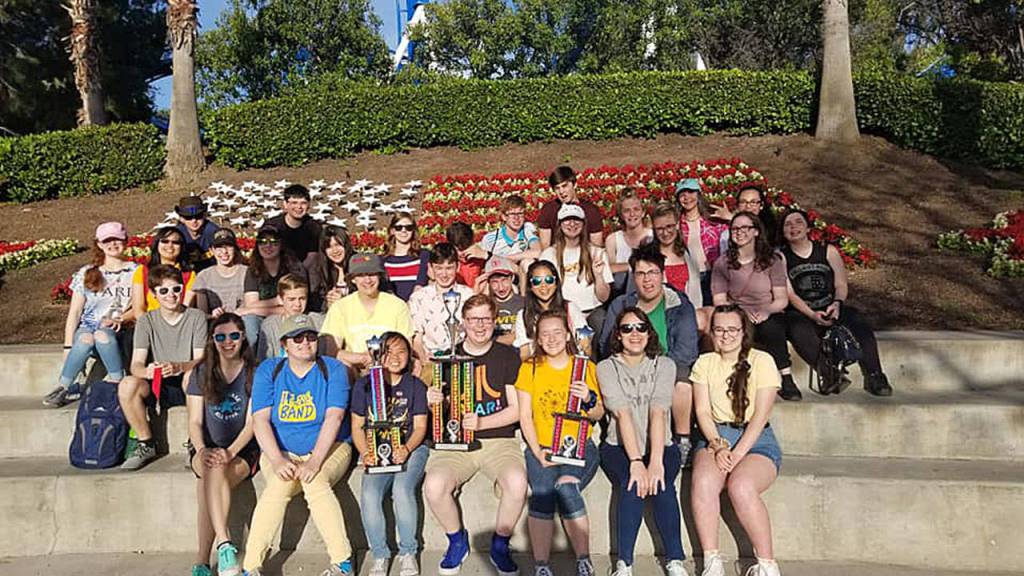 Everett High School Wind Ensemble and Jazz Band with their trophy. (Everett High School)