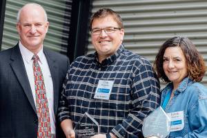 From left, Community Transit CEO Emmett Heath, and commuter champions Craig Ferguson and Lynda Newton. (Community Transit)