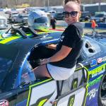 Haley Constance climbs in the NASCAR Super Late Models car driven by her dad, Joe Constance, as she helps get it ready for a race. Still just 13, shes been making a name for herself in the Pacific Northwest junior racing circuits in recent years.