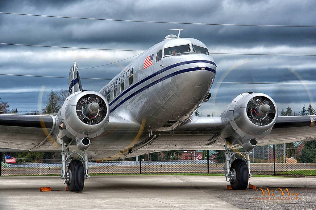 The Historic Flight Foundations DC-3 is shown getting a pre-flight engine check. (Di Chapman)
