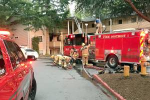 Woman injured, 5 displaced by apartment fire near Mill Creek