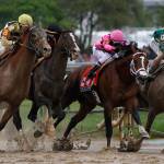 Flavien Prat on Country House (left) races against Luis Saez on Maximum Security (second from right) during the 145th running of the Kentucky Derby on May 4, 2019, at Churchill Downs in Louisville, Ky. Maximum Security was disqualified and Country House won the race. (AP Photo/John Minchillo)