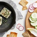 This warm, herby feta will make your guests reach for seconds