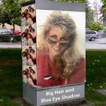 This photo illustration is a mockup of what the traffic signal box might look like for Lynnwoods Big Hair and Blue Eye Shadow photo contest to art up a box near the Alderwood mall. Thats Shannon Sessions, Lynnwood city councilwoman, in her 1988 Meadowdale High School graduation photo.                                (City of Lynnwood)