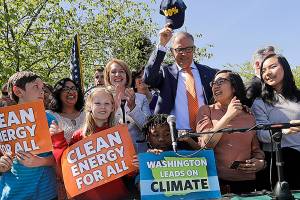 Inslee signs mandate for carbon-free electricity by 2045