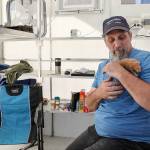Roger Evans and his hamster lived in a demo Pallet shelter brought to New Hope Fellowship. He hopes to use the units to create a tiny home village on church grounds. (Lizz Giordano / The Herald)