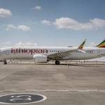 An Ethiopian Airlines Boeing 737 Max 8 sits grounded at Bole International Airport in Addis Ababa, Ethiopia, on March 23. The CEO of Ethiopian Airlines says his airline might never fly the Boeing 737 Max again after a deadly crash in March, and if it does, it will wait until other carriers use the plane first. (AP Photo/Mulugeta Ayene, File)