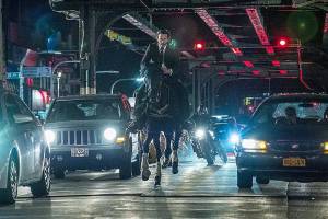 Keanu Reeves wisely still letting his fists do the talking