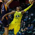 Seattles Jordin Canada (right) yells after being fouled by Phoenixs Stephanie Talbot during a preseason game against Phoenix on Wednesday at Angel of the Winds Arena in Everett. (Olivia Vanni / The Herald)
