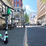 Gillian Flaccus / Associated Press file                                A Lime electric scooter on a street in downtown Portland.