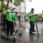 E-scooters were beginning to be distributed in downtown Everett Friday morning. (Lizz Giordano / The Herald)