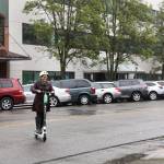 Mayor Cassie Franklin returns from her e-scooter inaugural ride Friday morning. (Lizz Giordano / The Herald)