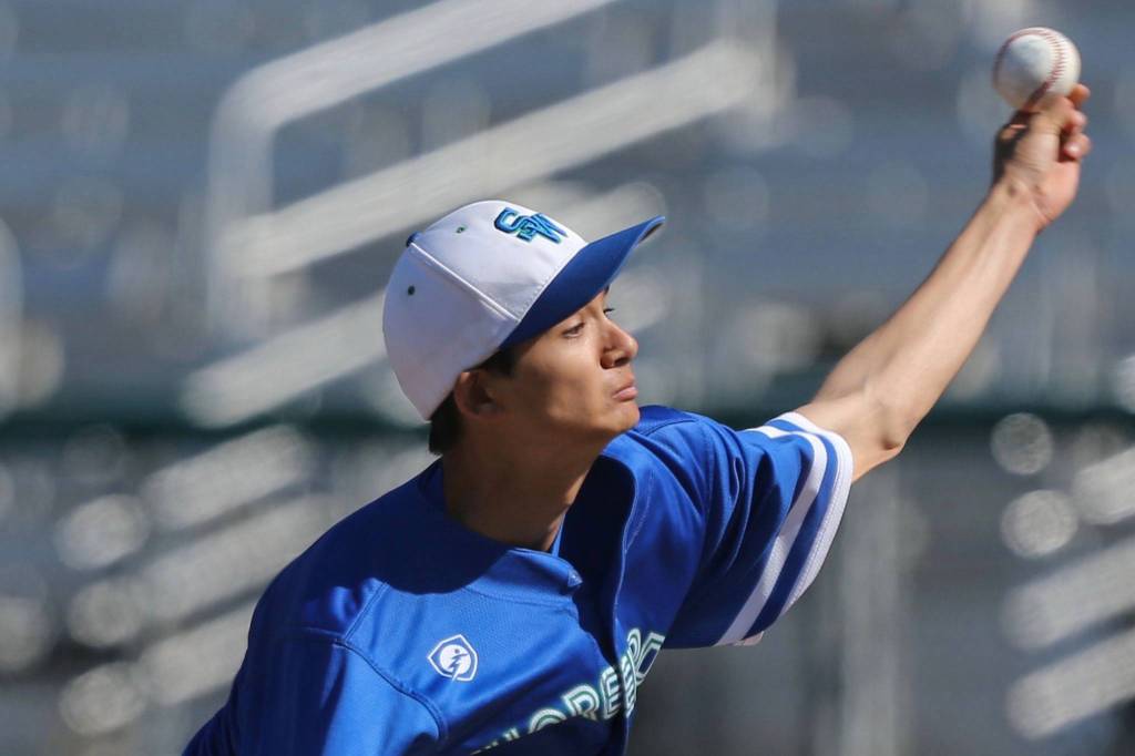 Shorewood pitcher Kenji Miller shut down Arlingtons high-powered offense in a district semifinal win to help the Thunderbirds advance to state for the fourth time in six years. (Kevin Clark / The Herald)
