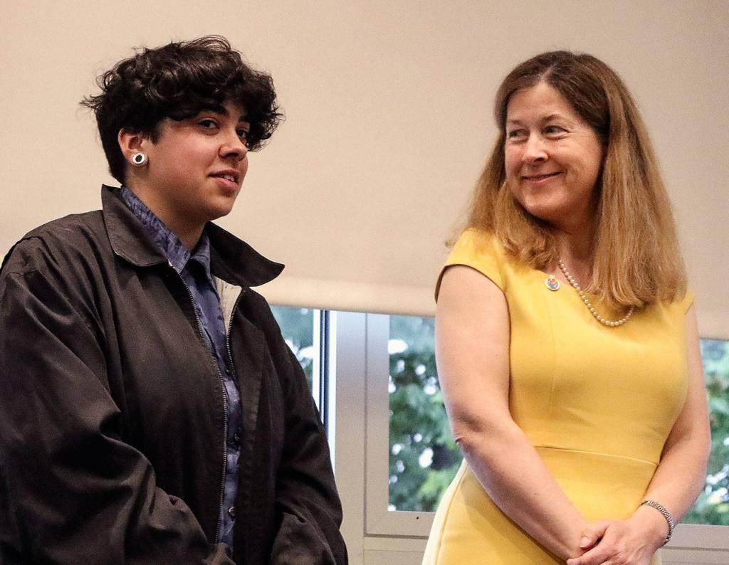 Anna Marie Laurence prepares to present the $6,000 Helen Jackson Memorial Scholarship to Alex Sunday, an Everett High art student. Laurence is the daughter of the late Sen. Henry M. Jackson and Helen Jackson, who died last year. (Dan Bates / The Herald)