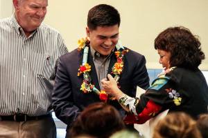 Emotions ran high Monday night as Don and Jan Jensen presented Joseph Hofman with a lovingly adorned lei and the Brett Akio Jensen Scholarship for $10,000. The Rotary Club of Everett presented more than $227,000 in scholarships to college-bound seniors.. (Dan Bates / The Herald)