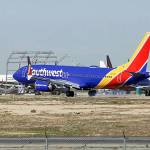 In this March 23 photo, a Southwest Airlines Boeing 737 Max aircraft lands at the Southern California Logistics Airport in the high desert town of Victorville, California. (AP Photo/Matt Hartman, file)