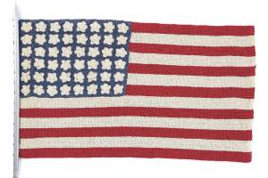 Vintage flag made of crocheted crepe paper sold for $344
