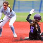 Lake Washingtons Addie Sapirstein slides into second base as Everetts Annie Fowler bobbles the throw Friday morning during the 3A Softball State Championship at the Regional Athletic Complex in Lacey. (Kevin Clark / The Herald)