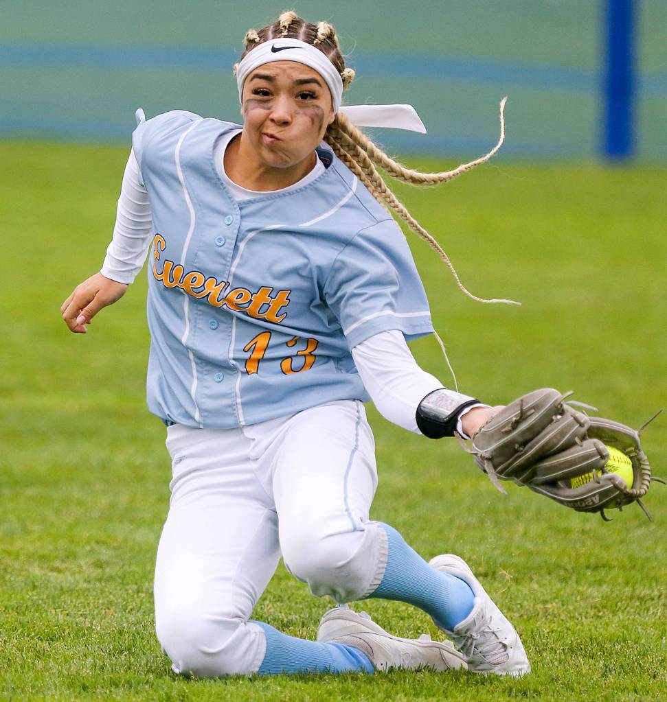 Everetts Jackie Rookaird makes a sliding catch against Lake Washington Friday morning during the 3A Softball State Championship at the Regional Athletic Complex in Lacey. (Kevin Clark / The Herald)