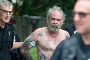 Police: Man wore company jacket as disguise to shoot wife