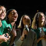 Seattle Storms Kaleena Mosqueda-Lewis, Crystal Langhorne, Sue Bird, Alysha Clark, and Natasha Howard react to their championship banner being revealed during the ring ceremony before the season opener game against the Phoenix Mercury on Saturday, May 25, 2019 in Everett, Wash. (Olivia Vanni / The Herald)
