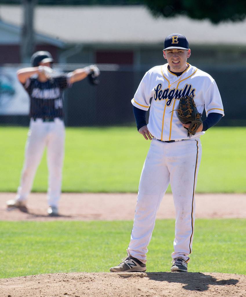 Everetts Nick Mardesich takes moment to gather himself as a Peninsula player celebrates at second base after the Seahawks go up four runs. Everett lost 6-2 to Peninsula in a 3A baseball state regional game at Sherman Anderson Field on May 18 in Mount Vernon. (Andy Bronson / The Herald)