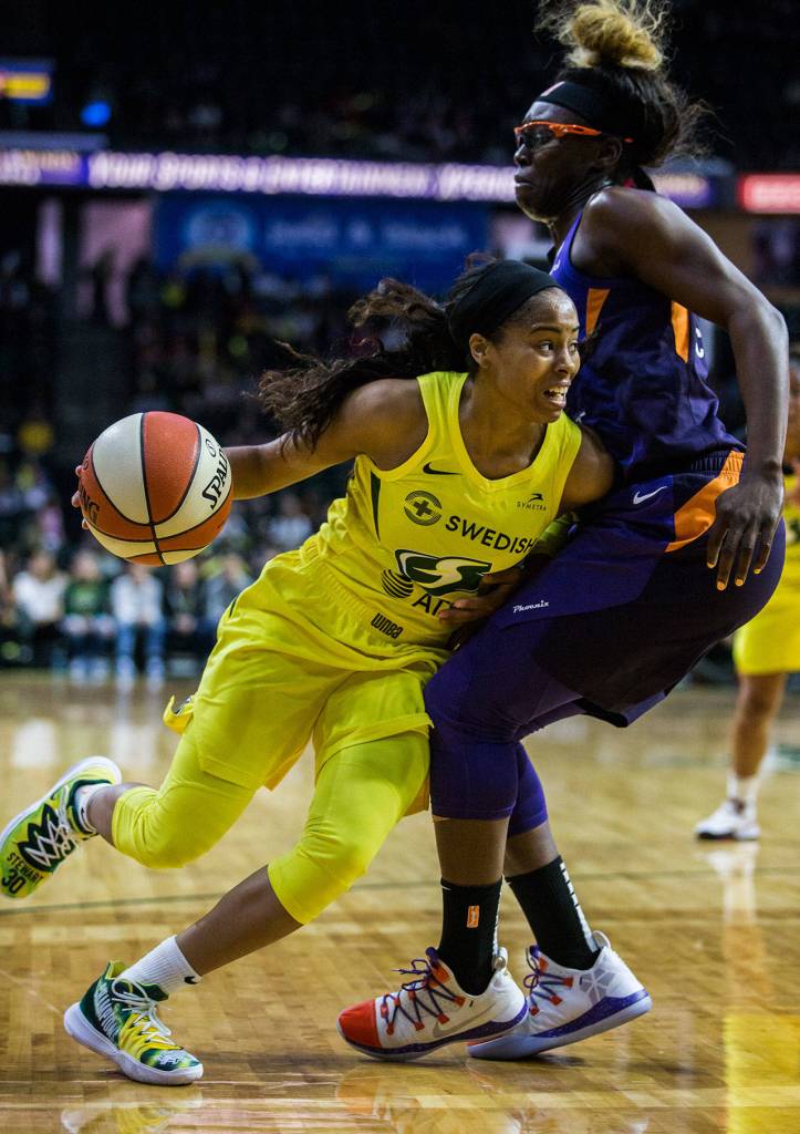 Seattle Storms Jordin Canada drives to the hoop during the season opener game against the Phoenix Mercury on Saturday, May 25, 2019 in Everett, Wash. (Olivia Vanni / The Herald)