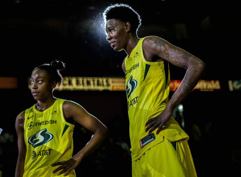 Seattle Storms Natasha Howard, right, and Jewell Loyd are interviews after the season opener game against the Phoenix Mercury on Saturday, May 25, 2019 in Everett, Wash. (Olivia Vanni / The Herald)