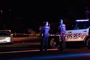 Everett police near Grand Avenue where a woman, who later died, was found in the road Saturday night. (Submitted photo)