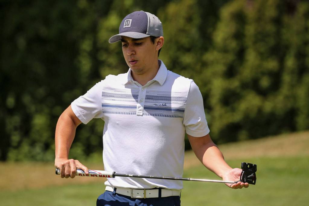Chris Vargas eyes a missed putt Sunday afternoon during the second round of the Snohomish County Amateur Golf Tournament at Harbour Pointe Golf Club in Mukilteo. (Kevin Clark / The Herald)
