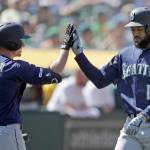 Ben Margot / Associated Press                                Seattles Domingo Santana (right) is congratulated by Kyle Seager (15) after hitting a home run off Oaklands Blake Treinen on Saturday in Oakland, California.