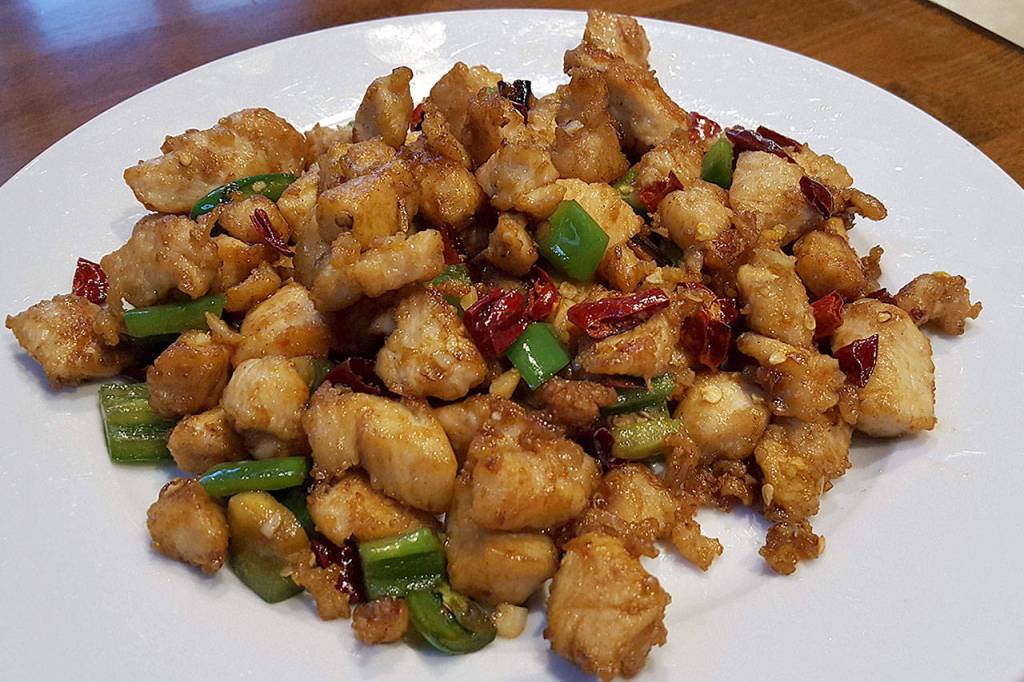 The spicy chicken with red and green chilies at Dumpling Generation. (Evan Thompson / The Herald)