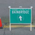 A sign points the way to the Bainbridge Island ferry. (Bainbridge Island Review)